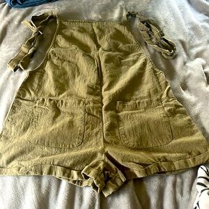 Green string top jumper suit size medium